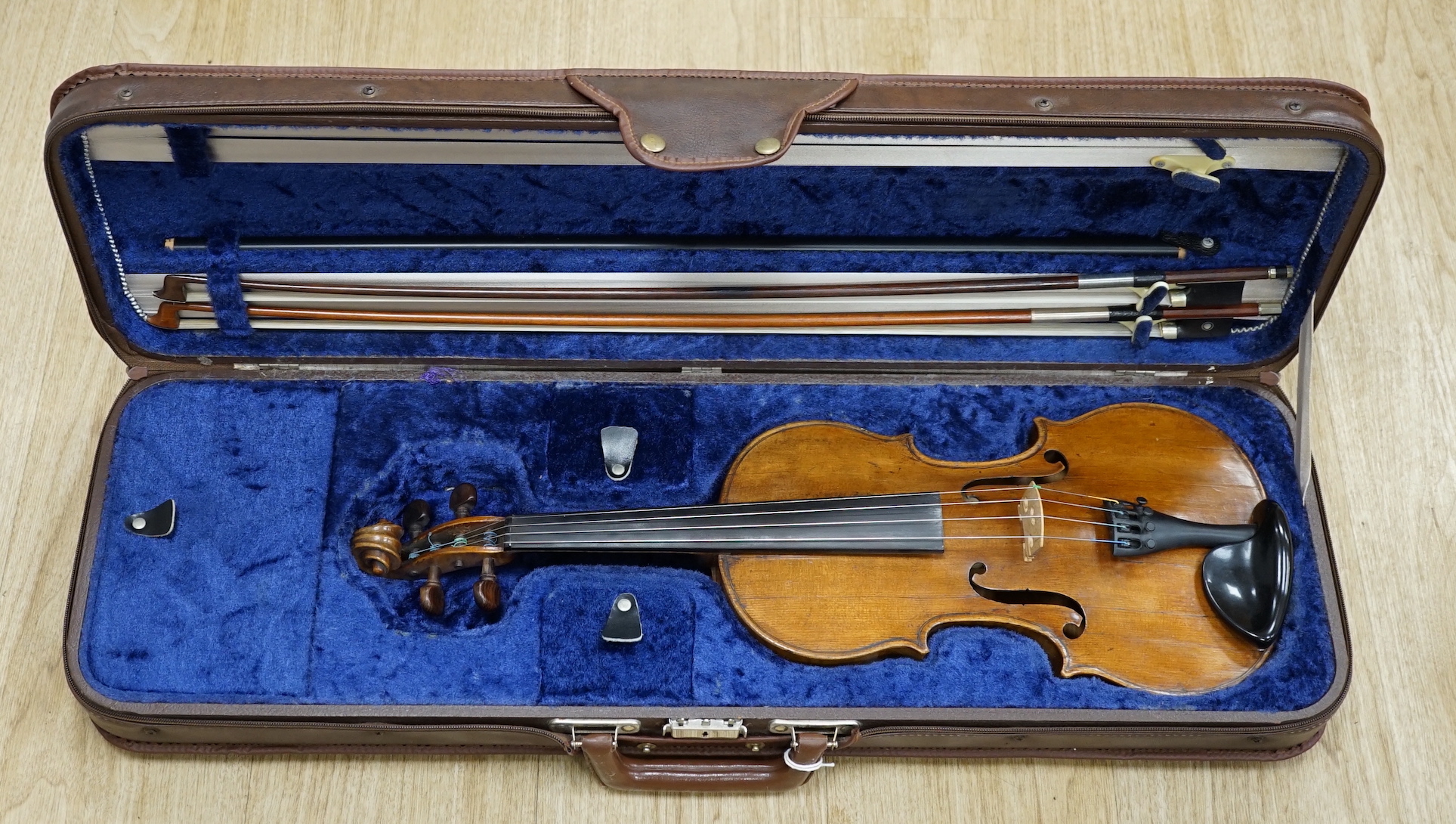 A cased 1830s violin by Didier Nicolas L'aine, branded inside the body, body length 36cm, with two bows, one bow stamped Louis Bazin CITES Submission references 7WRVMZ9B and F37GW7ZR